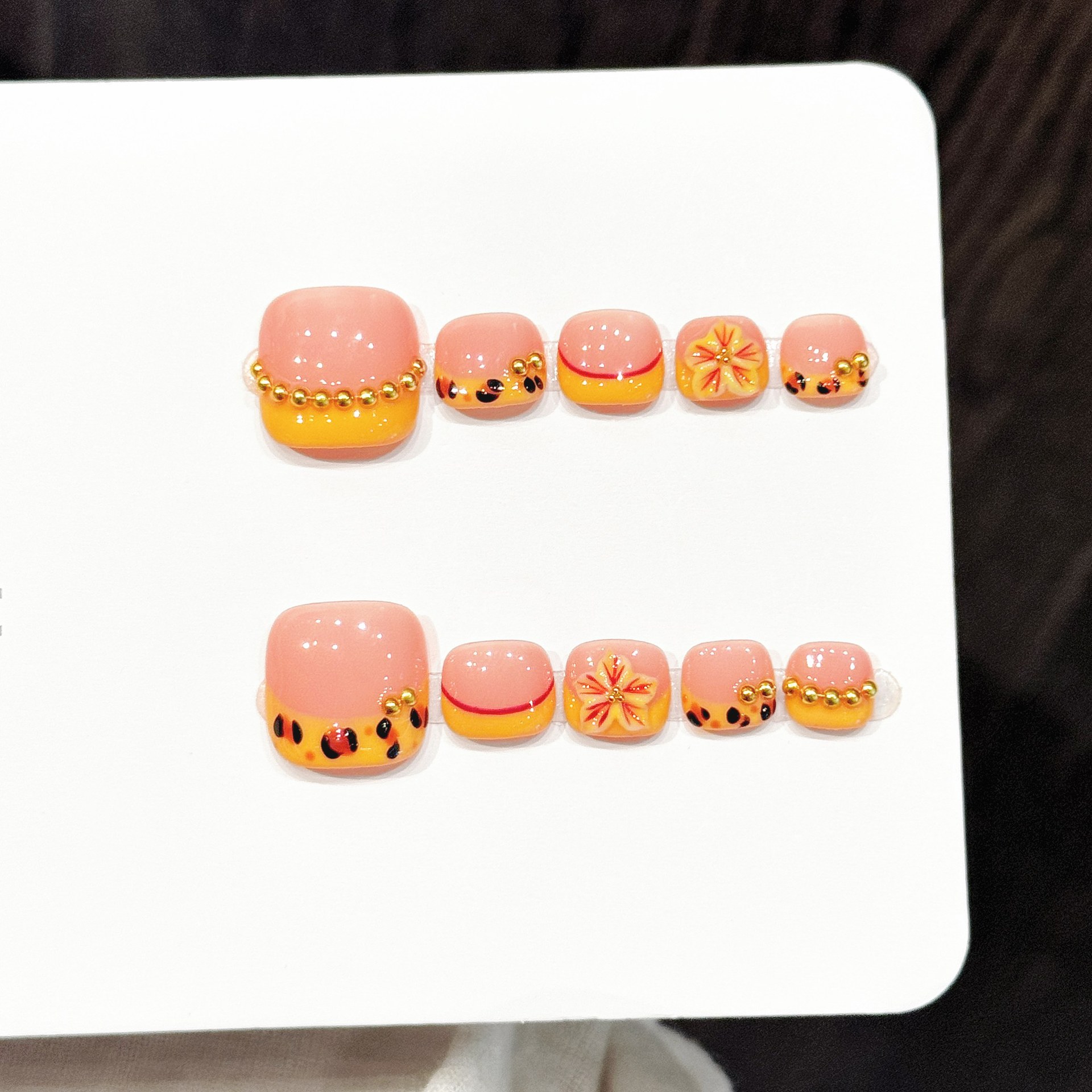 Nail Art Orange - เล็บเท้าปลอมทำมือ 10 ชิ้น ลายดอกไม้สีสันสดใส 